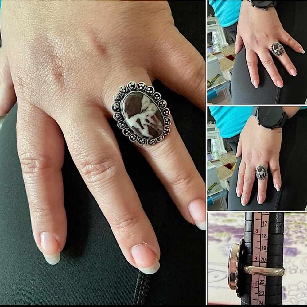 Ring is 925 sterling with a beautiful Zebra Jasper stone.
Size is 9 1/2.